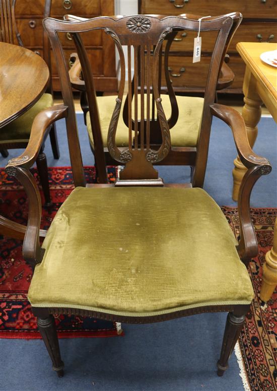 A set of eight Hepplewhite design mahogany dining chairs (two arm, six single)